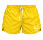 Riviera Retro zwemshort Sunbeam Yellow, geel vooraanzicht met SWC-logo en wit trekkoord